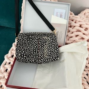Hammit crossbody retired cowhide purse. Like new. Original packaging.